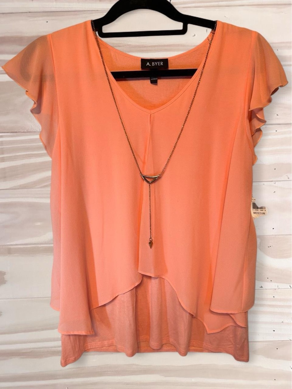 NWT A. Byer orange top size M with necklace attached.